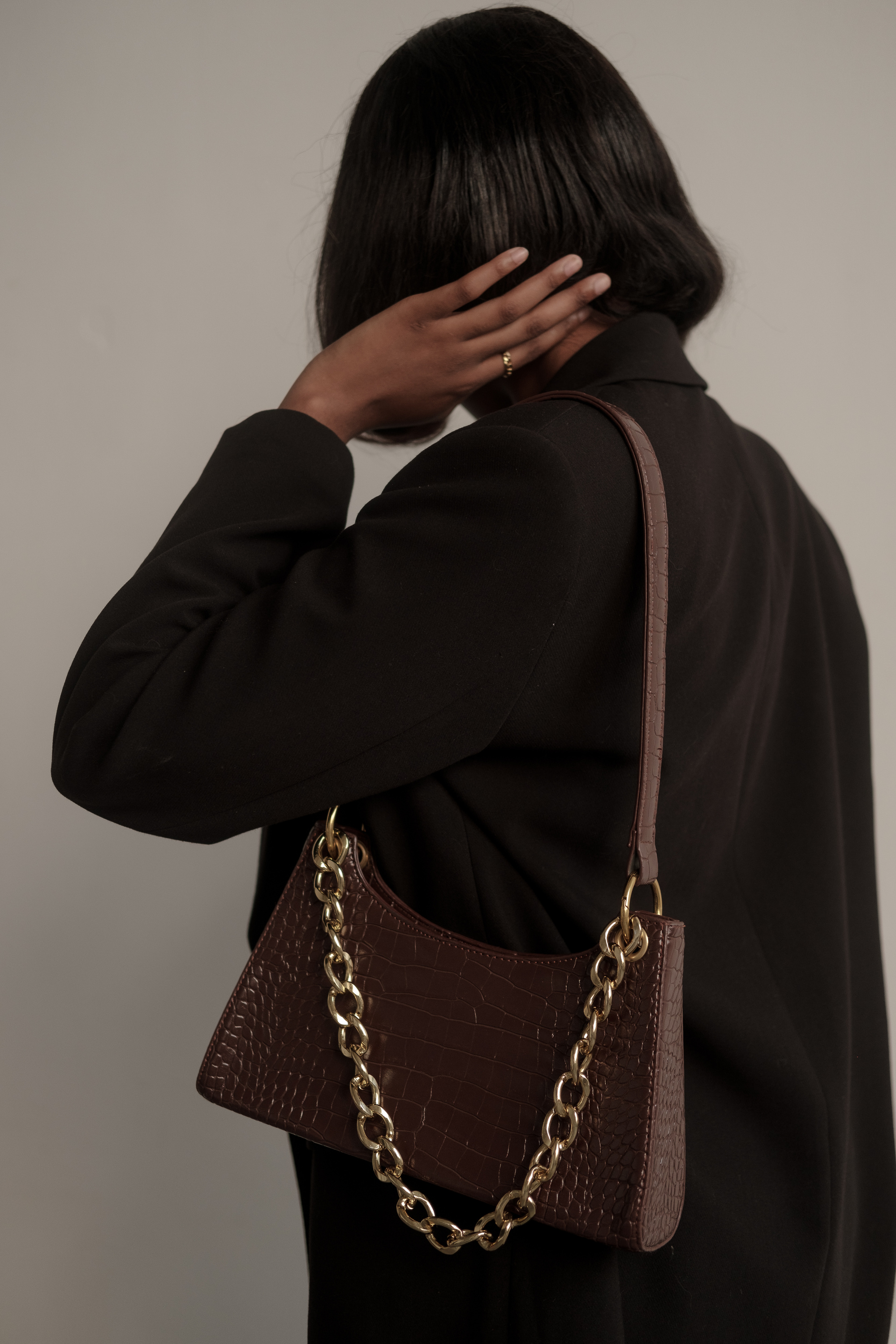 Woman with Black Dress with Handbag